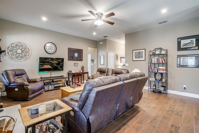 living area with recessed lighting, baseboards, visible vents, ceiling fan, and wood finished floors