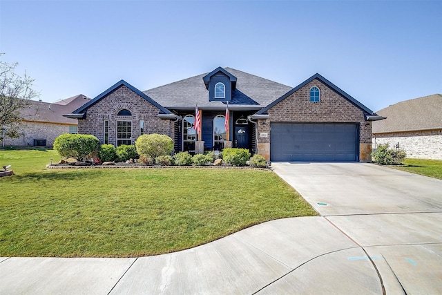 view of front of property featuring central AC unit, an attached garage, concrete driveway, a front yard, and brick siding