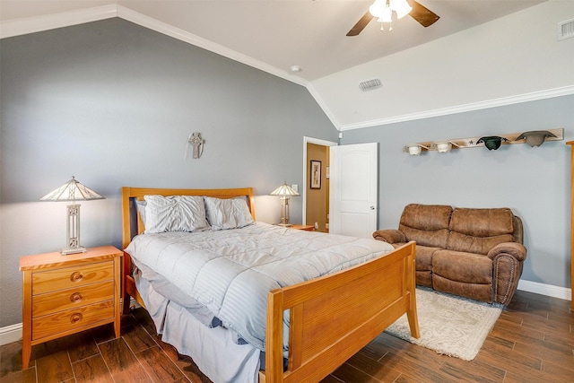 bedroom with baseboards, visible vents, wood finished floors, and vaulted ceiling