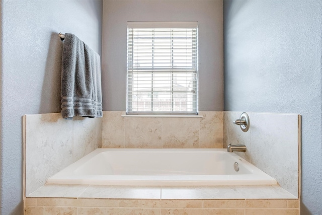 bathroom featuring a bath