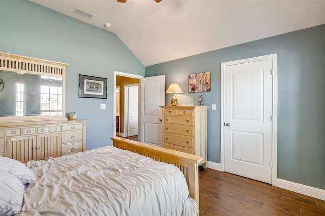 bedroom featuring visible vents, baseboards, ceiling fan, wood finished floors, and lofted ceiling