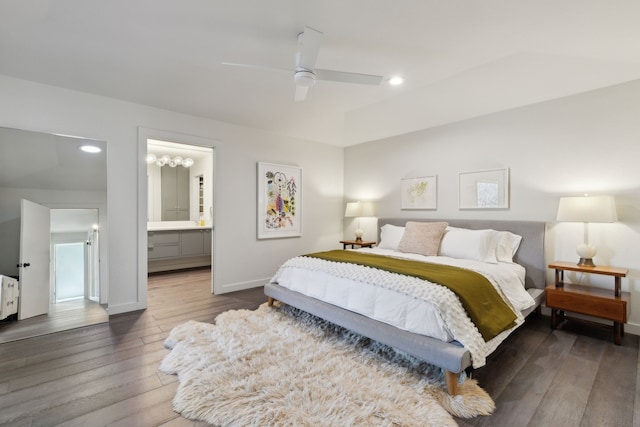 bedroom featuring a ceiling fan, wood-type flooring, ensuite bathroom, baseboards, and recessed lighting