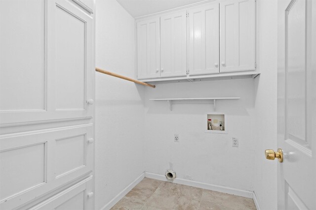 4629 Cripple Creek Rd, Haltom City, TX 76137 - clothes washing area featuring baseboards, hookup for an electric dryer, hookup for a washing machine, and cabinet space