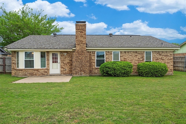 4629 Cripple Creek Rd, Haltom City, TX 76137 - rear view of house featuring roof with shingles, fence, a chimney, and a patio area