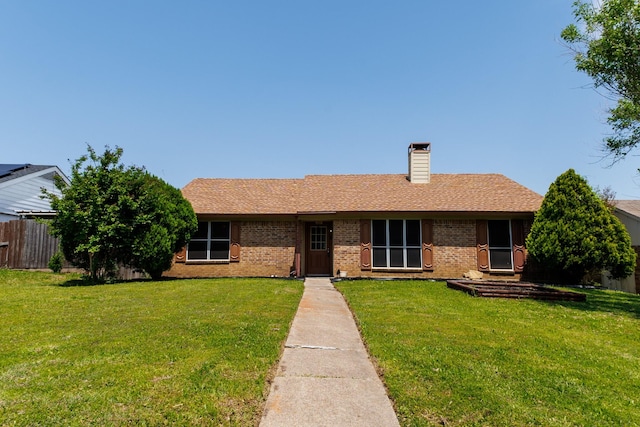 1201 High Valley Dr, Garland, TX 75041 - ranch-style house featuring fence, brick siding, a chimney, and a front lawn