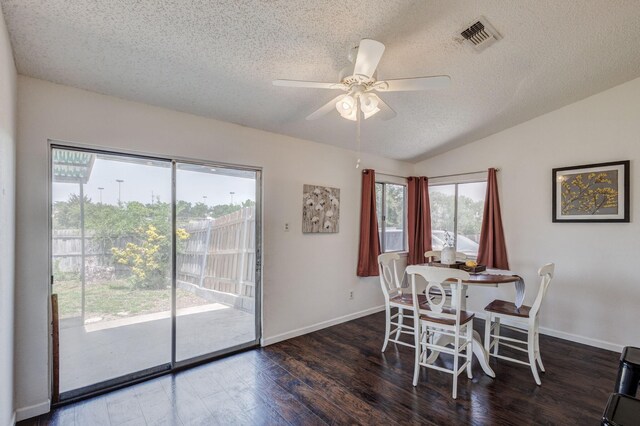 1201 High Valley Dr, Garland, TX 75041 - dining space with visible vents, wood finished floors, vaulted ceiling, and a textured ceiling