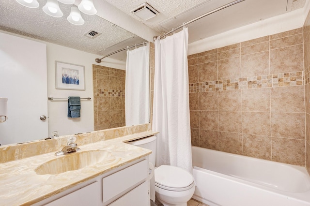 1201 High Valley Dr, Garland, TX 75041 - bathroom featuring a textured ceiling, shower / bathtub combination with curtain, vanity, and visible vents