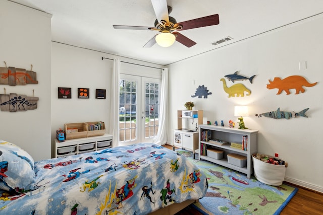 6926 Santa Monica Dr, Dallas, TX 75223 - bedroom with baseboards, access to exterior, visible vents, a ceiling fan, and wood finished floors