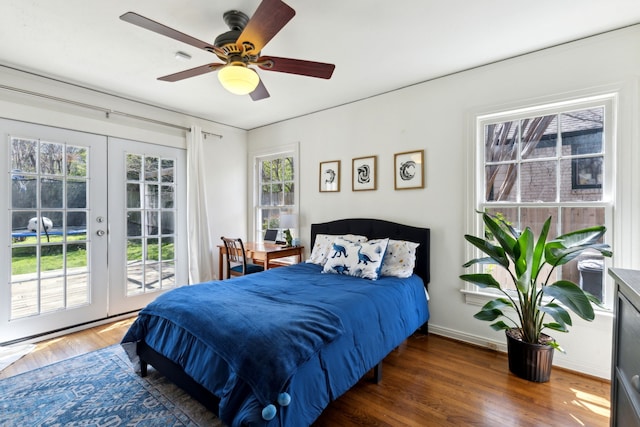 6926 Santa Monica Dr, Dallas, TX 75223 - bedroom with baseboards, ceiling fan, access to outside, wood finished floors, and french doors