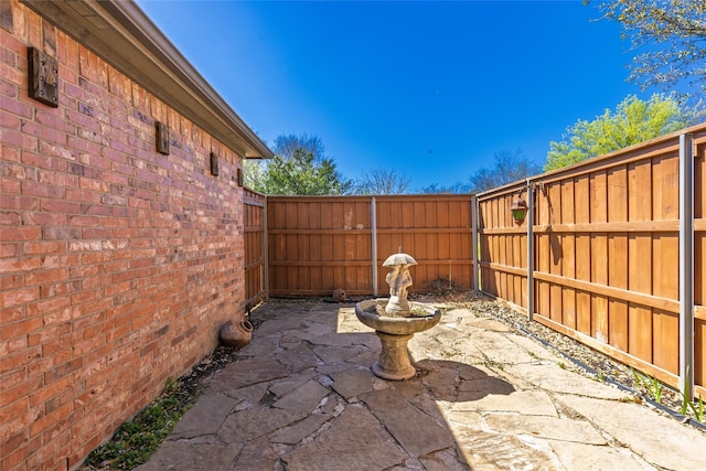 view of patio featuring a fenced backyard