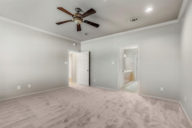 unfurnished bedroom featuring ornamental molding, visible vents, and light carpet