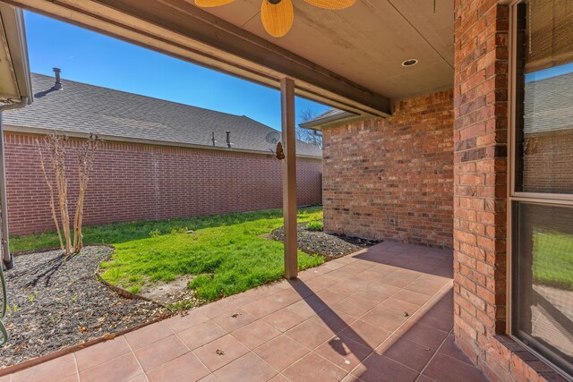 view of patio / terrace featuring ceiling fan