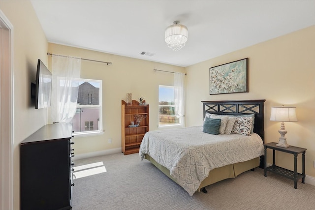 3905 Dashiell Dr, Flower Mound, TX 75022 - bedroom featuring carpet flooring, baseboards, and a chandelier