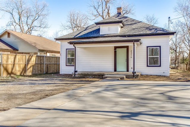 2316 Marburg St, Dallas, TX 75215 - view of front of property with a chimney, fence, and roof with shingles