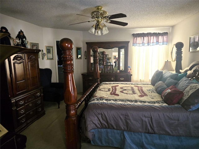 bedroom featuring carpet flooring, a textured ceiling, and ceiling fan