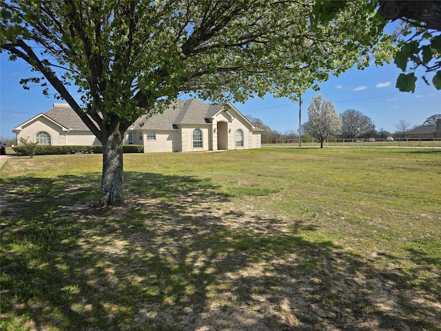 view of yard featuring fence