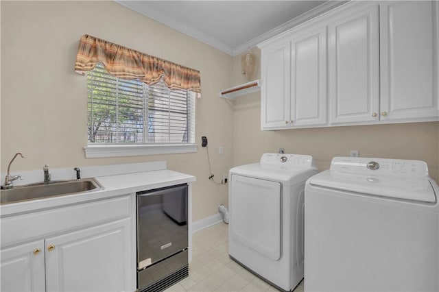 2034 Oak Glen Dr, Mcgregor, TX 76657 - laundry area featuring cabinet space, washing machine and dryer, ornamental molding, and baseboards