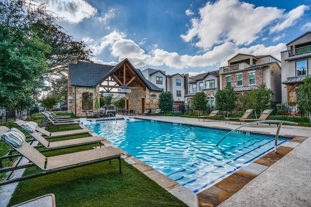 3703 Panalero Ln, Dallas, TX 75209 - community pool featuring a patio and a residential view
