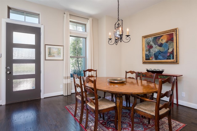 3703 Panalero Ln, Dallas, TX 75209 - dining room featuring dark wood-style floors, a chandelier, and baseboards
