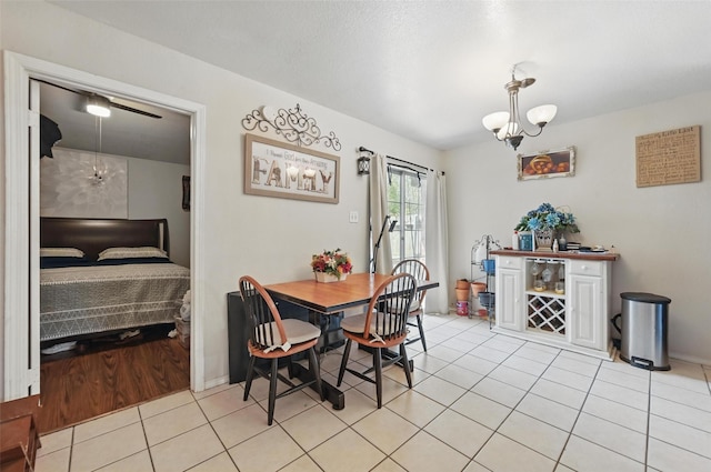 3217 Whatley Dr, Garland, TX 75043 - dining space with light tile patterned floors and baseboards