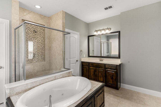 7813 Saint Clair Dr, Mckinney, TX 75071 - full bathroom featuring vanity, a jetted tub, a shower stall, baseboards, and visible vents