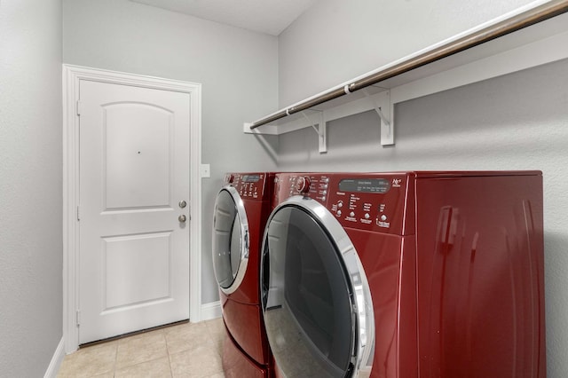 7813 Saint Clair Dr, Mckinney, TX 75071 - laundry area featuring independent washer and dryer, laundry area, baseboards, and light tile patterned floors