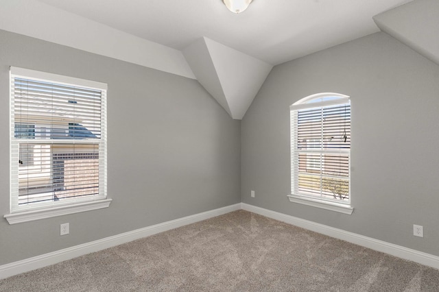 7813 Saint Clair Dr, Mckinney, TX 75071 - unfurnished room with plenty of natural light, baseboards, vaulted ceiling, and carpet