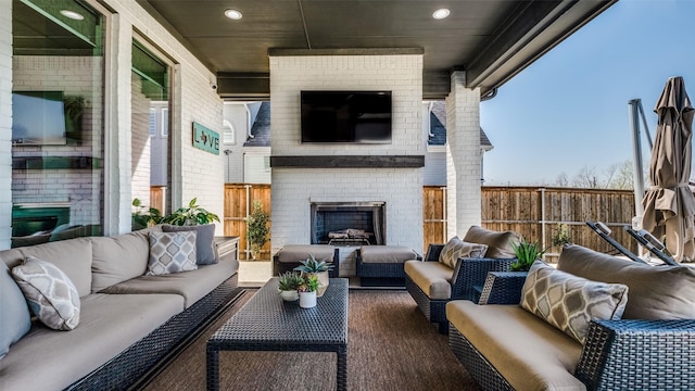 6023 Manderlay Dr, Frisco, TX 75034 - view of patio / terrace featuring an outdoor living space with a fireplace and fence