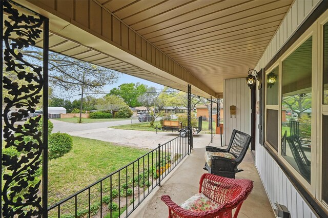 ranch-style house with brick siding and a front lawn