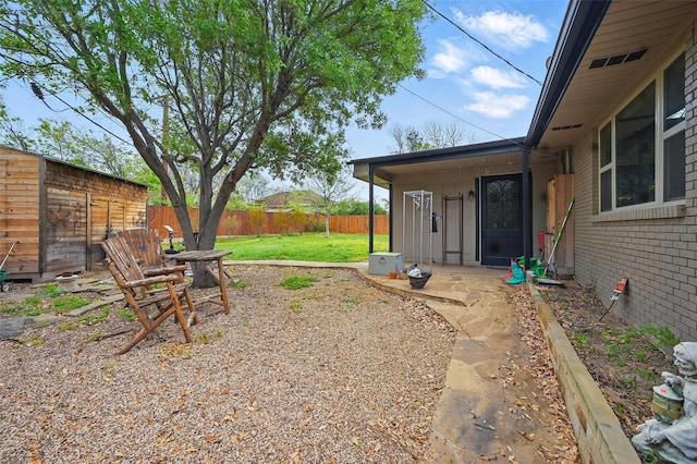 view of yard with fence