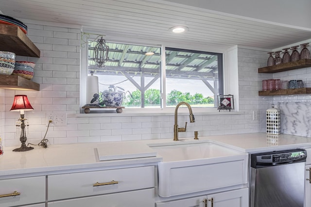 1125 Old Airport Rd, Weatherford, TX 76087 - kitchen with light countertops, a sink, open shelves, tasteful backsplash, and dishwasher