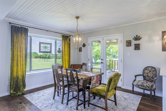 1125 Old Airport Rd, Weatherford, TX 76087 - dining space featuring french doors, plenty of natural light, dark wood-type flooring, and a chandelier