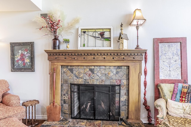 1125 Old Airport Rd, Weatherford, TX 76087 - room details with baseboards and a tiled fireplace