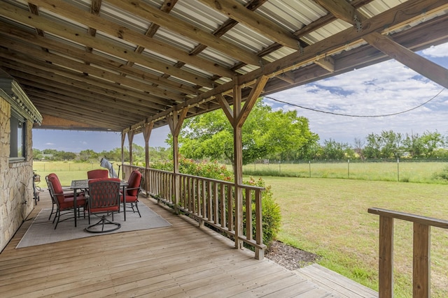 1125 Old Airport Rd, Weatherford, TX 76087 - wooden terrace featuring a lawn, outdoor dining area, and fence