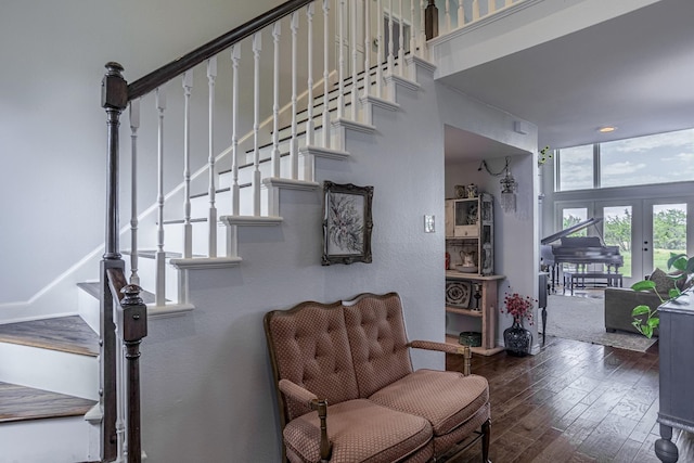 1125 Old Airport Rd, Weatherford, TX 76087 - staircase with french doors and wood finished floors