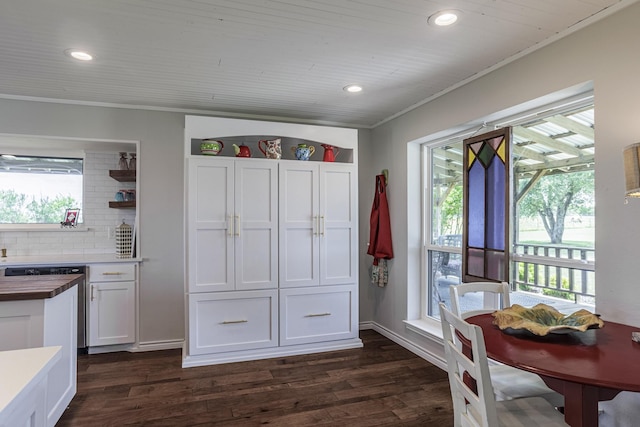 1125 Old Airport Rd, Weatherford, TX 76087 - dining space featuring dark wood-style floors, crown molding, and recessed lighting