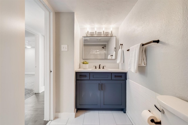 5920 Sandhurst Ln Unit 232, Dallas, TX 75206 - bathroom with toilet, vanity, and a shower