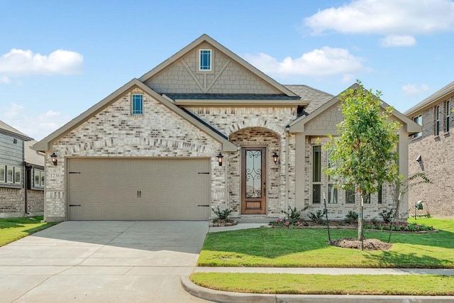 1236 Arrowwood Dr, Aubrey, TX 76227 - french country home with driveway, a front yard, brick siding, a garage, and a shingled roof
