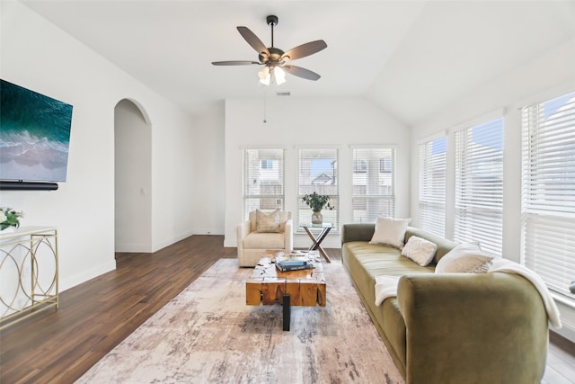 1236 Arrowwood Dr, Aubrey, TX 76227 - living area featuring lofted ceiling, baseboards, arched walkways, a ceiling fan, and wood finished floors