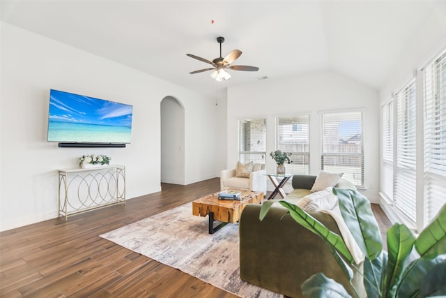 1236 Arrowwood Dr, Aubrey, TX 76227 - living area featuring baseboards, wood finished floors, a ceiling fan, arched walkways, and vaulted ceiling