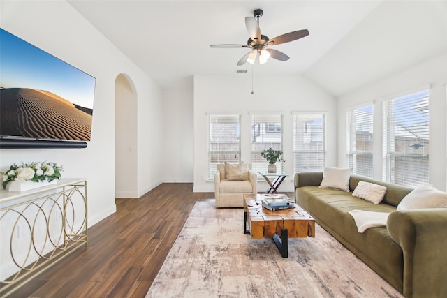 1236 Arrowwood Dr, Aubrey, TX 76227 - living area featuring vaulted ceiling, baseboards, arched walkways, ceiling fan, and wood finished floors