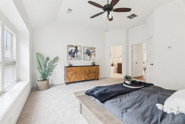 1236 Arrowwood Dr, Aubrey, TX 76227 - carpeted bedroom featuring connected bathroom, visible vents, a ceiling fan, and vaulted ceiling