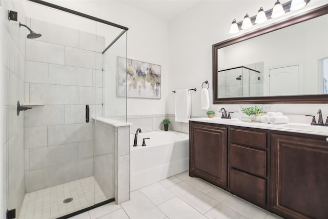 1236 Arrowwood Dr, Aubrey, TX 76227 - full bathroom featuring double vanity, a sink, a stall shower, and a garden tub