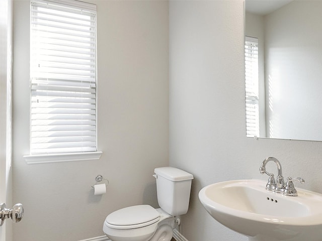 5024 Wilder Ave, Celina, TX 76227 - bathroom with a sink, toilet, and baseboards