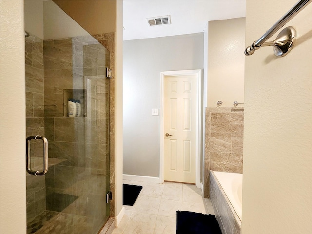 full bath featuring visible vents, a relaxing tiled tub, and a stall shower