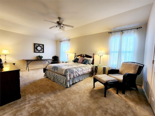 bedroom featuring baseboards, a ceiling fan, and carpet floors