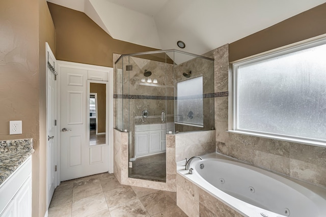 5440 Sycamore Dr, Midlothian, TX 76065 - full bath with a whirlpool tub, a stall shower, vanity, and vaulted ceiling