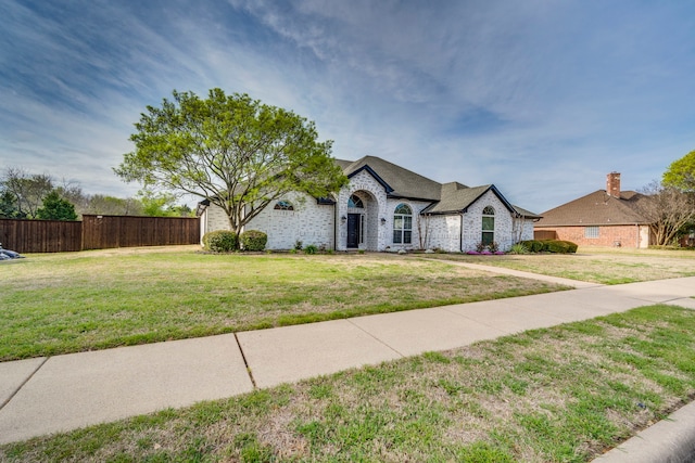 5440 Sycamore Dr, Midlothian, TX 76065 - french country inspired facade with brick siding and a shingled roof