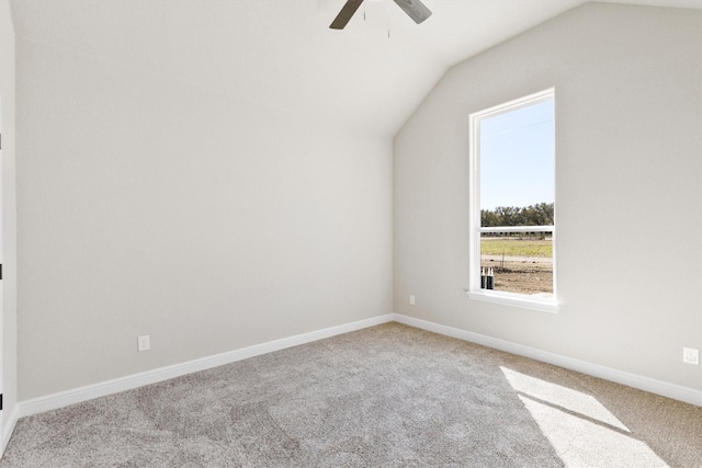 bonus room with carpet, baseboards, vaulted ceiling, and ceiling fan