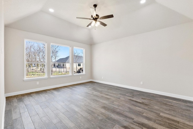 empty room featuring dark wood finished floors, recessed lighting, ceiling fan, and lofted ceiling